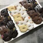 Mask Masks Dipped Chocolate cookies sold by the dozen