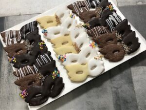 Mask Masks Dipped Chocolate cookies sold by the dozen