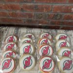 NJ Devils Hockey team themed cookies - hockey cookie favors